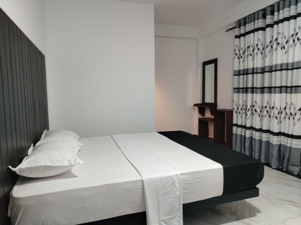 Deluxe Double Room Lotus guest room view at Shanthala Guest